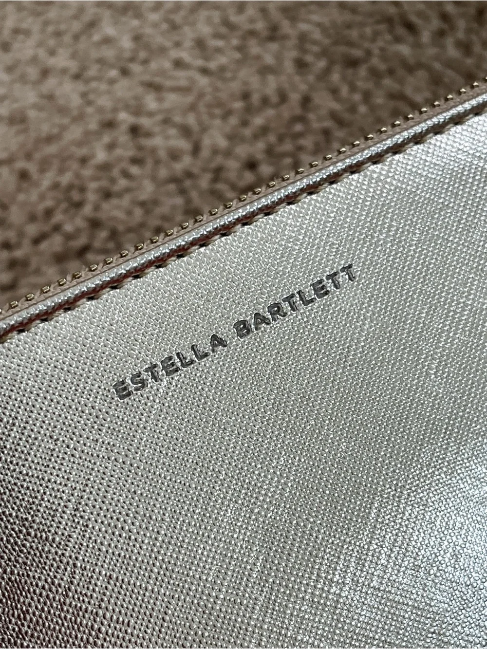 Set of three flat pouches by Estella Bartlett and Katie loxton